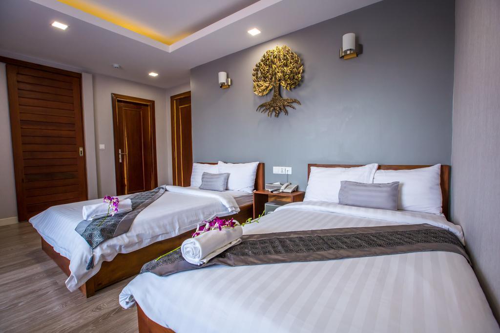 Le Cocon Boutique Hotel Phnom Penh Habitación foto